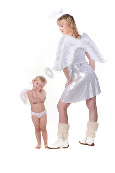 Pequena menina anjo e anjo mulher adulta — Fotografia de Stock