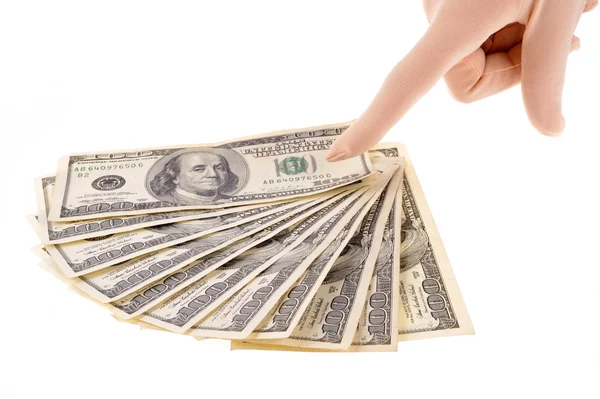 Finger pointing to dollars banknotes — Stock Photo, Image