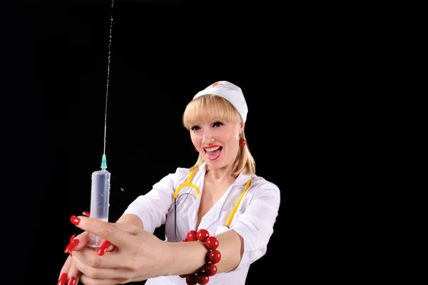 Verpleegster met spuit — Stockfoto