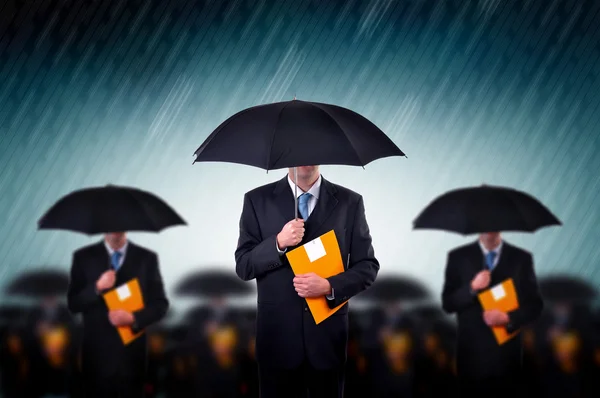 Businessmen in rain — Stock Photo, Image