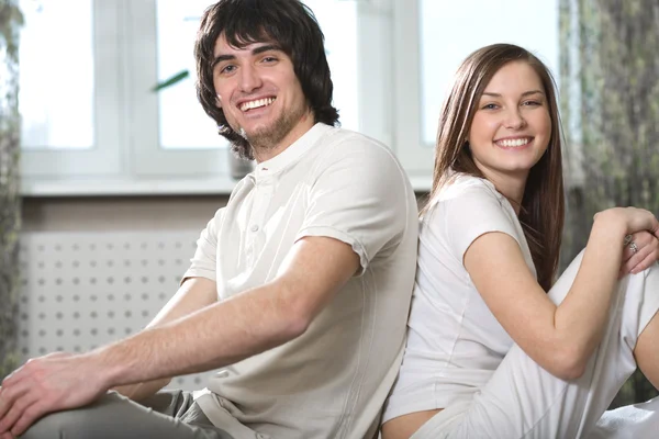 Boy and girl with hours — Stock Photo, Image