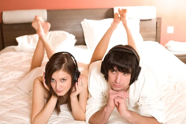 Naked girl in bed and boy — Stock Photo, Image