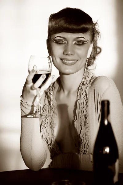 Menina alegre com vinho de vidro — Fotografia de Stock