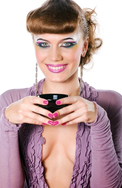 Glimlachend meisje met koffiekopje — Stockfoto