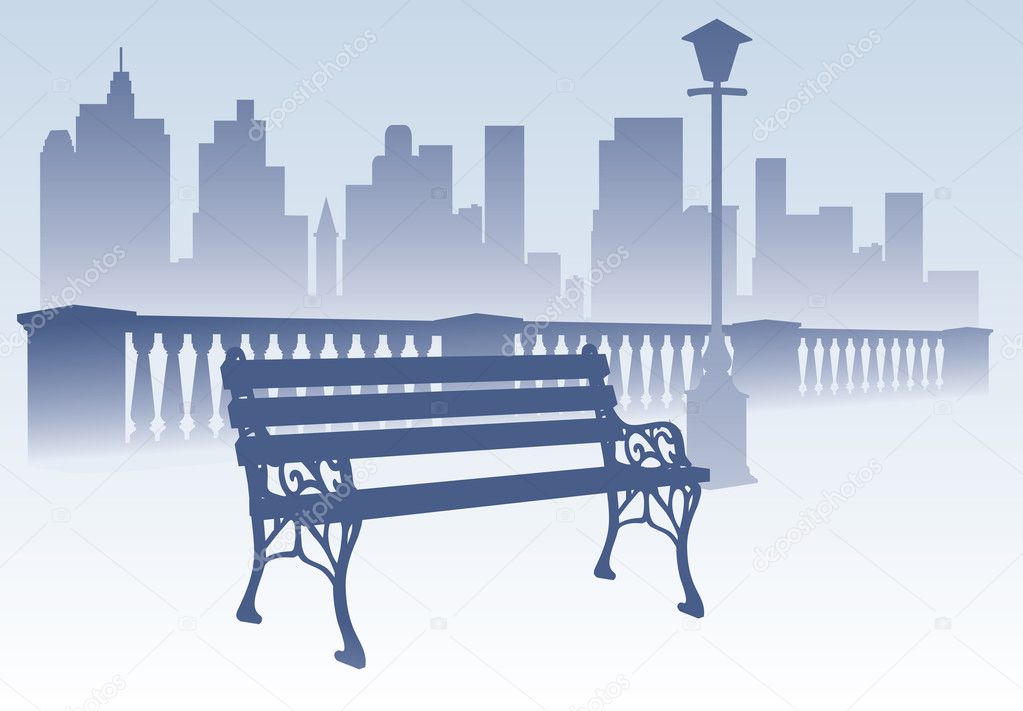 Park bench on the city background