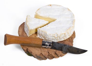 Camembert on the wooden board clipart