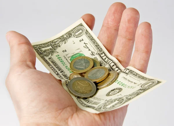 Hand with euro and dollar — Stock Photo, Image