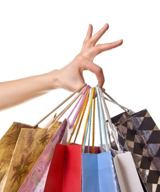 Hand holding shopping bags clipart