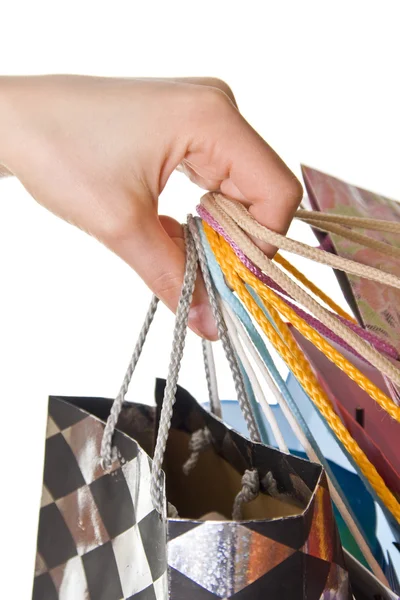 Hand holding shopping bags — Stock Photo, Image