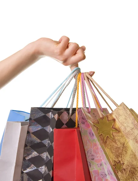 Hand holding shopping bags — Stock Photo, Image