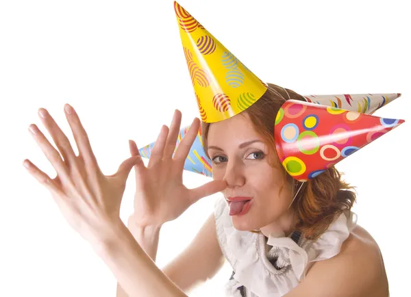 Joking woman in three party hats — Stock Photo, Image
