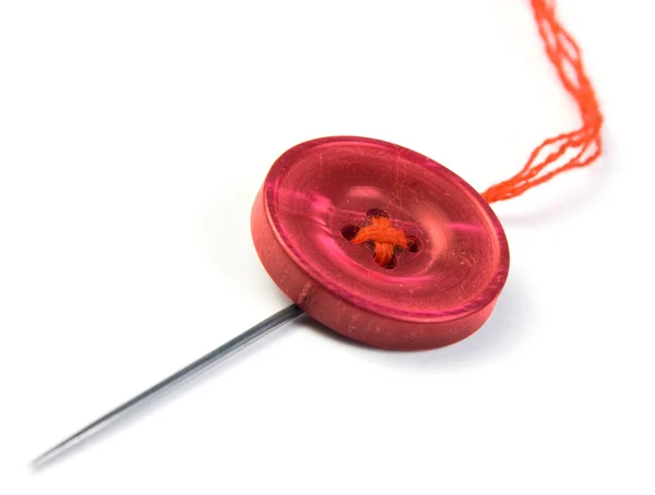 Sewing needle with button — Stock Photo, Image