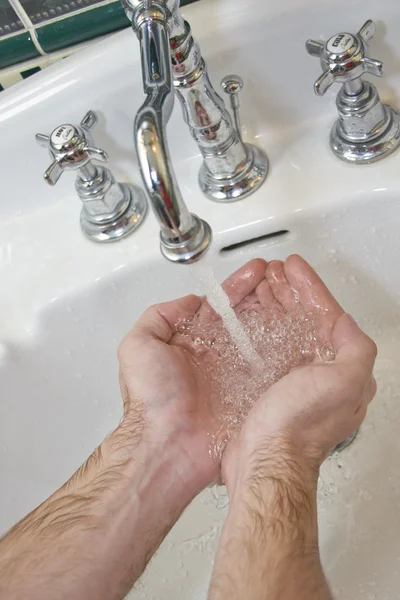 Woda w dłonie — Zdjęcie stockowe
