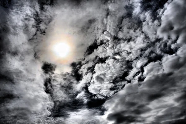 Dramatic cloudy sky and sun — Stock Photo, Image
