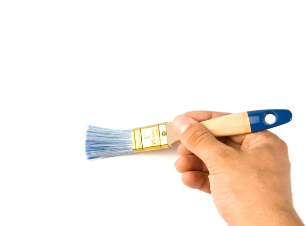 Painting the wall with a paint brush — Stock Photo, Image