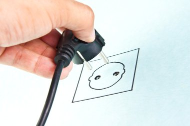 Plugging electrical cable to sketching socket clipart