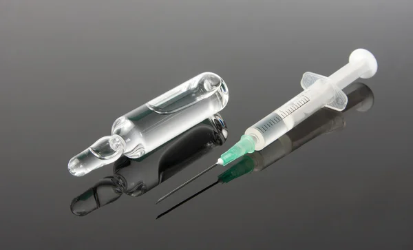 Medicine and syringe — Stock Photo, Image