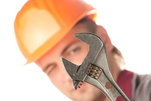 Hombre trabajador con llave ajustable —  Fotos de Stock