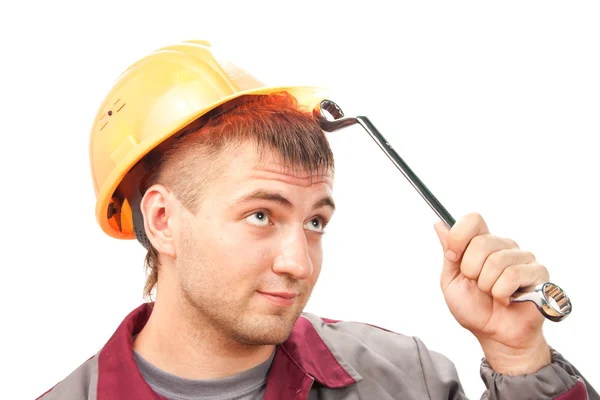 Smilimg working man with wrench — Stock Photo, Image
