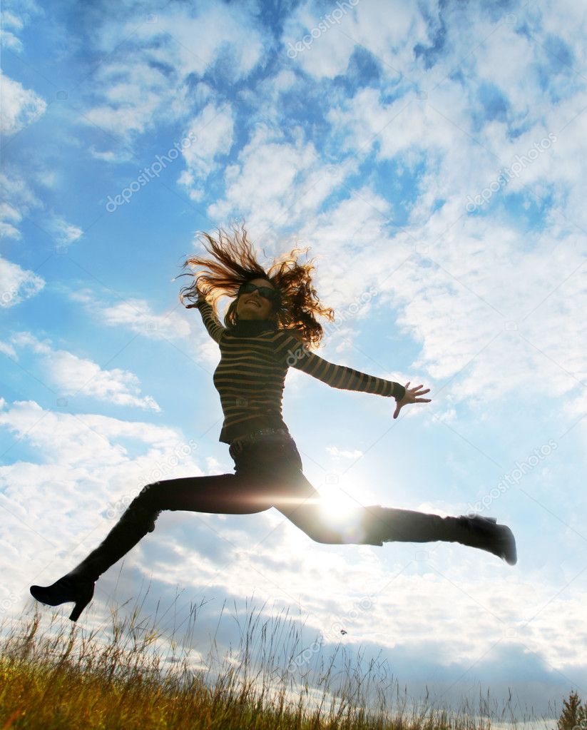 Playful woman jumping