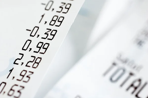 Close-up of cash register receipts — Stock Photo, Image