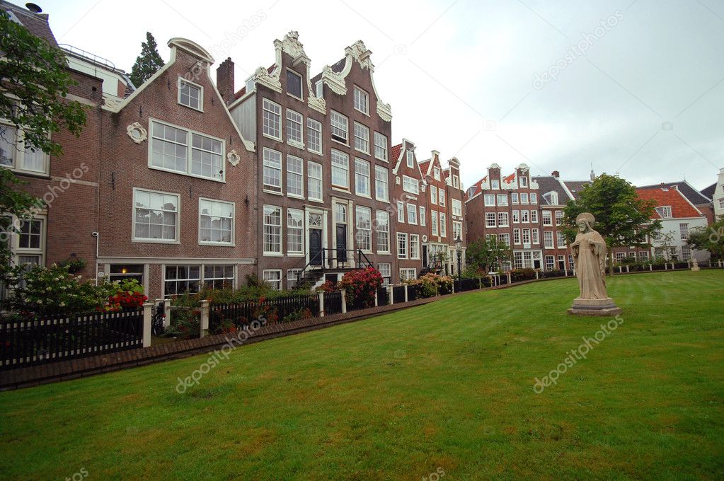 Old houses and sculpture on the lawn