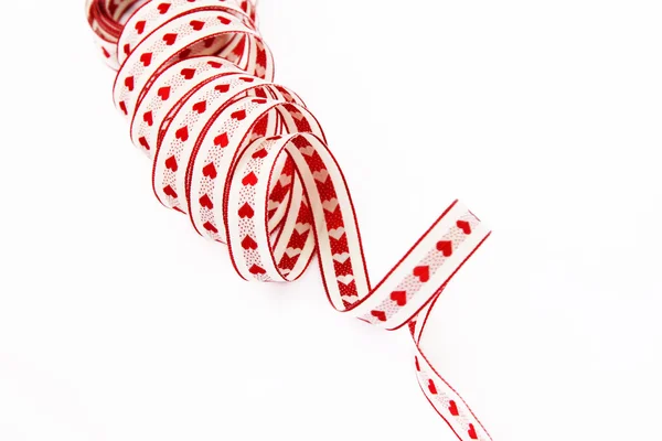 Ribbon with red hearts — Stock Photo, Image