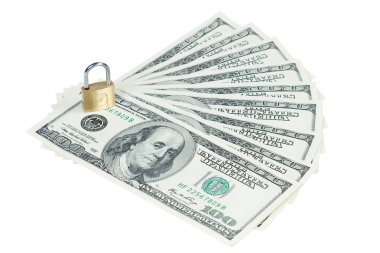 Money dollars under lock and key