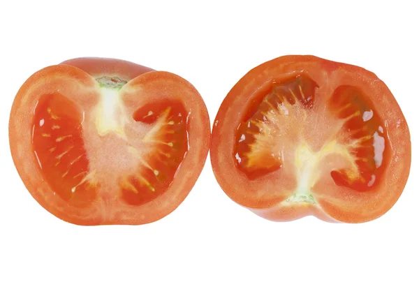 Tomate wird in zwei Hälften geschnitten — Stockfoto