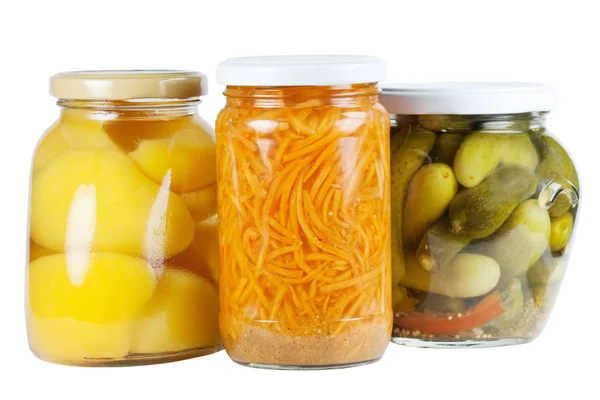 Konzervované meruňky, okurky a mrkev Stock Obrázky