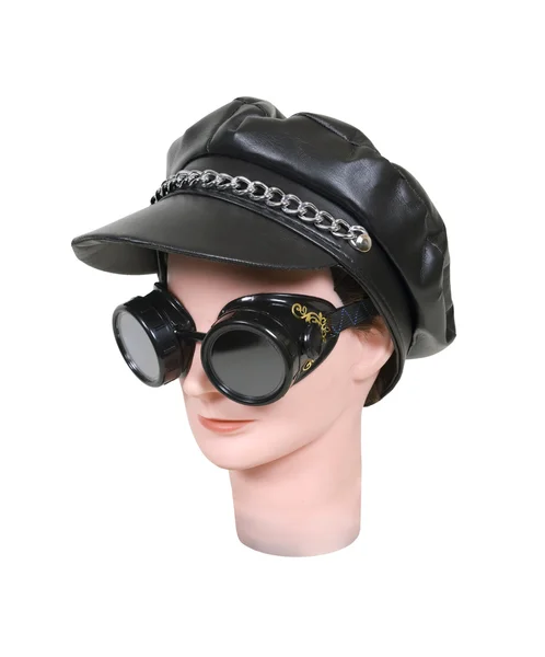 Black goggles and chained hat — Stock Photo, Image
