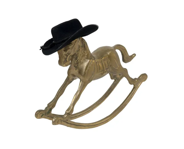 Cavalo de balanço com chapéu de cowboy — Fotografia de Stock