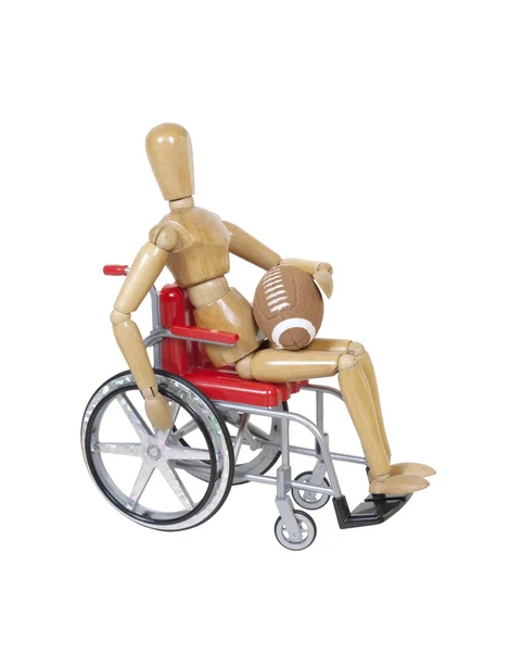 Em uma cadeira de rodas segurando um futebol — Fotografia de Stock