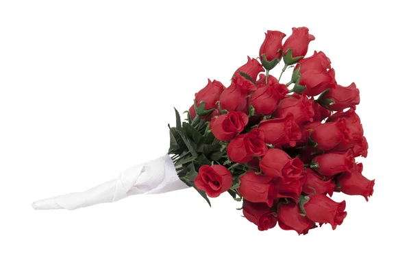 Červené růže v papírový ručník — Stock fotografie