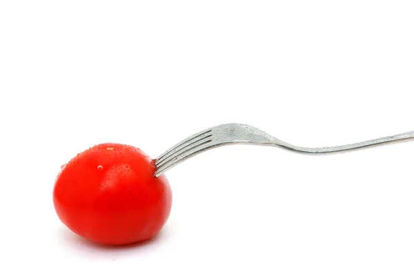 Tomato and fork — Stock Photo, Image