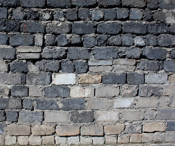 Parede de tijolos ásperos cinza — Fotografia de Stock