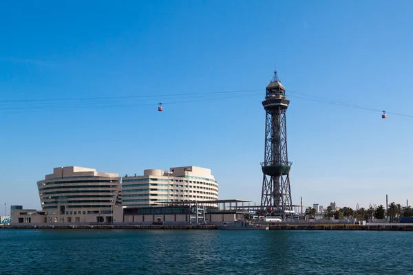 stock image Cableway tower in old port in Barcelona