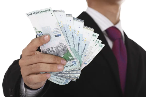 Uomo d'affari che mostra denaro — Foto Stock