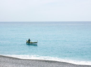 Fishing man at Nice, France clipart