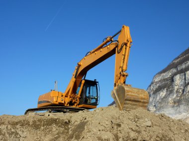 Turuncu mekanik digger