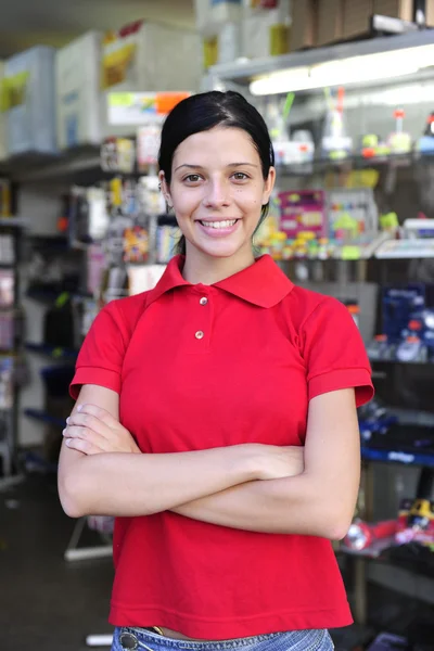 Teenage girl working part time in a stationery s — Stock Photo, Image