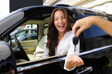 Businesswoman receiving keys of her new off-road clipart