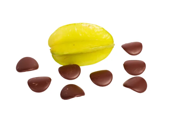 Star fruit with chocolate petals — Stock Photo, Image