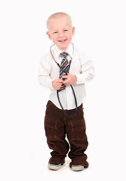 Barnet låtsas vara en läkare — Stockfoto