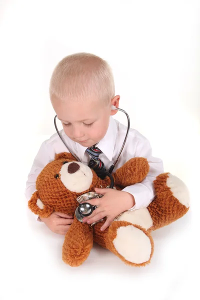 Söt vårdar barn läkare — Stockfoto