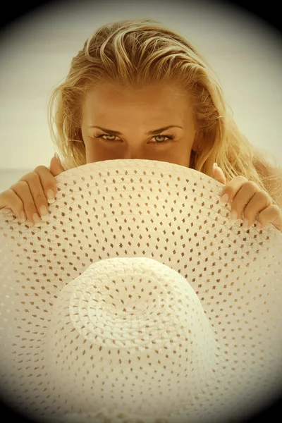 Blonde with white hat — Stock Photo, Image