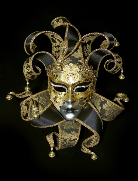 Venezianische Maske auf schwarzem Hintergrund Stockfoto