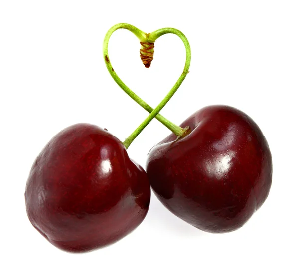 Cherry sticks shows a heart shape — Stock Photo, Image