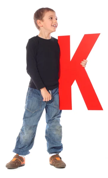 字母"k"的男孩 — 图库照片