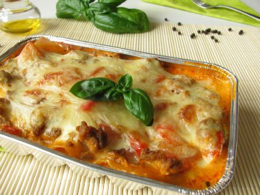 Homemade lasagne with red pepper and minced meat clipart